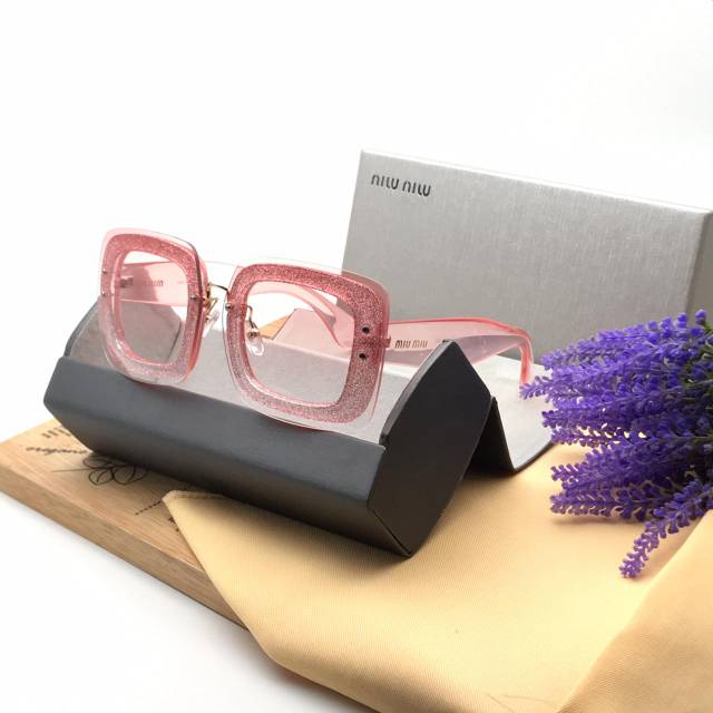 Kacamata MiuMiu  7124