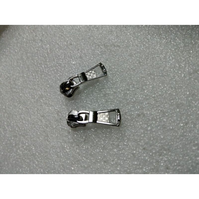 kepala resleting gigi besi metal no.5 warna Nikel & black nikel (100 pcs).