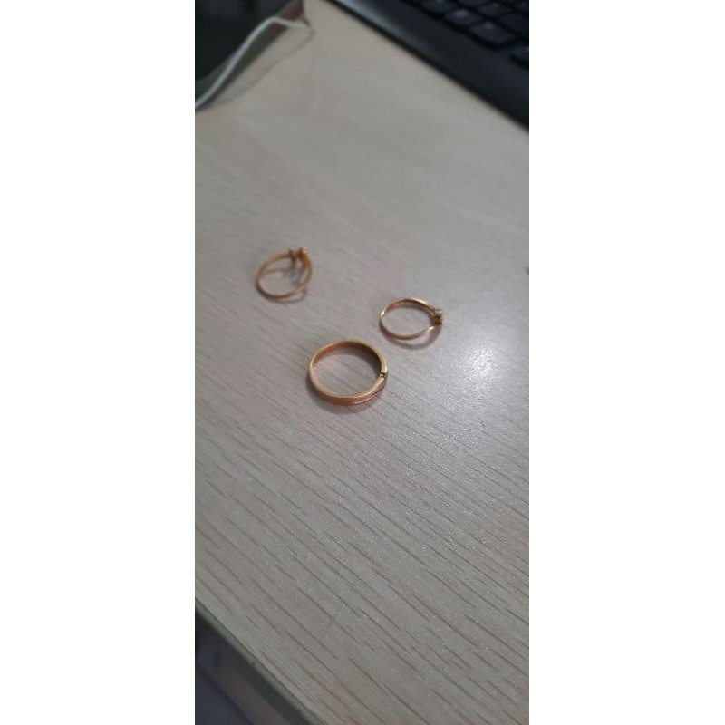 

Emas 700 % ring 18, 14, 14