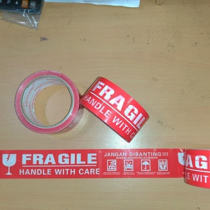 

PEREKAT-PENGIKAT- OPP LAKBAN FRAGILE 2" 48MMX50M GOLDLAND - PUTIH -PENGIKAT-PEREKAT.