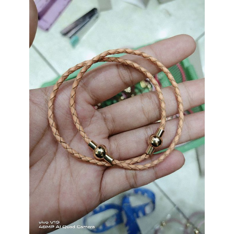 gelang tali kulit kunci magnet