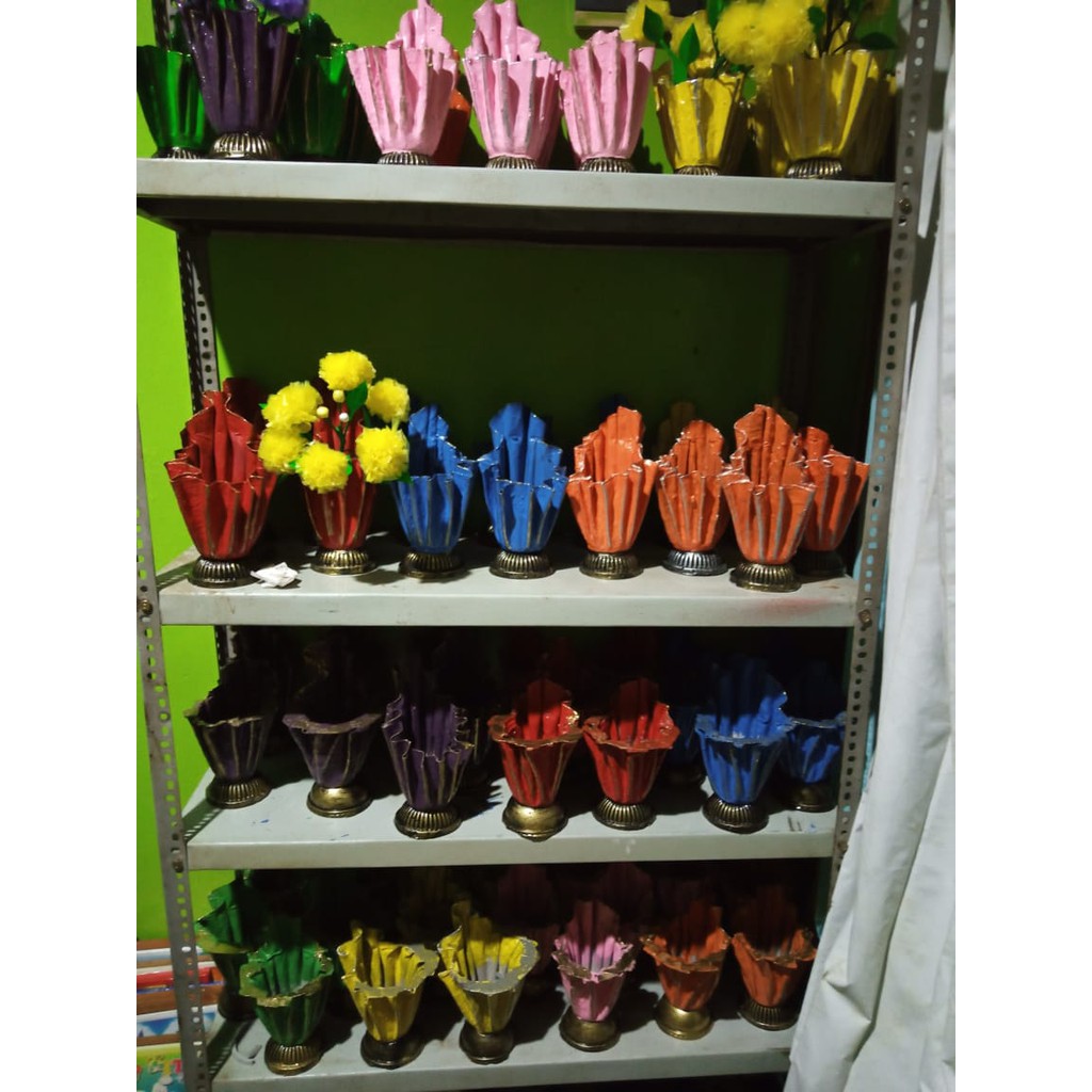Pot bunga dari barang bekas (handuk/kaos)
