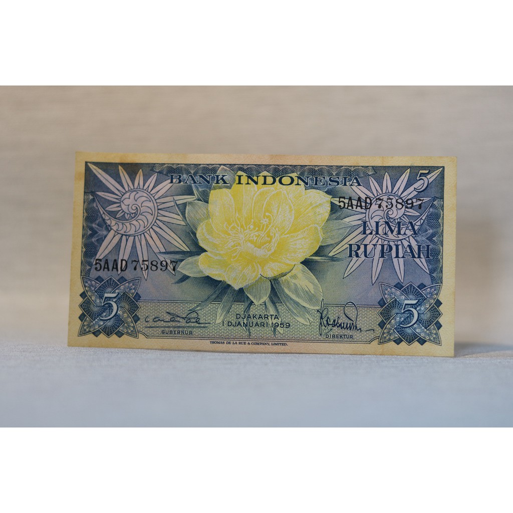 Uang Rupiah kuno - 5 Rupiah gambar bunga kuning
