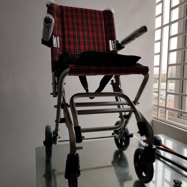 Kursi roda Travelling