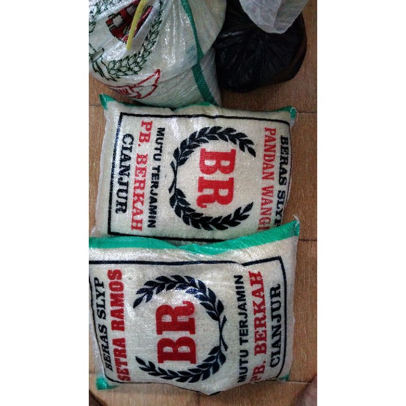 

BERAS ASLI CIANJUR JAWA BARAT NASINYA PULEN DAN NIKMAT