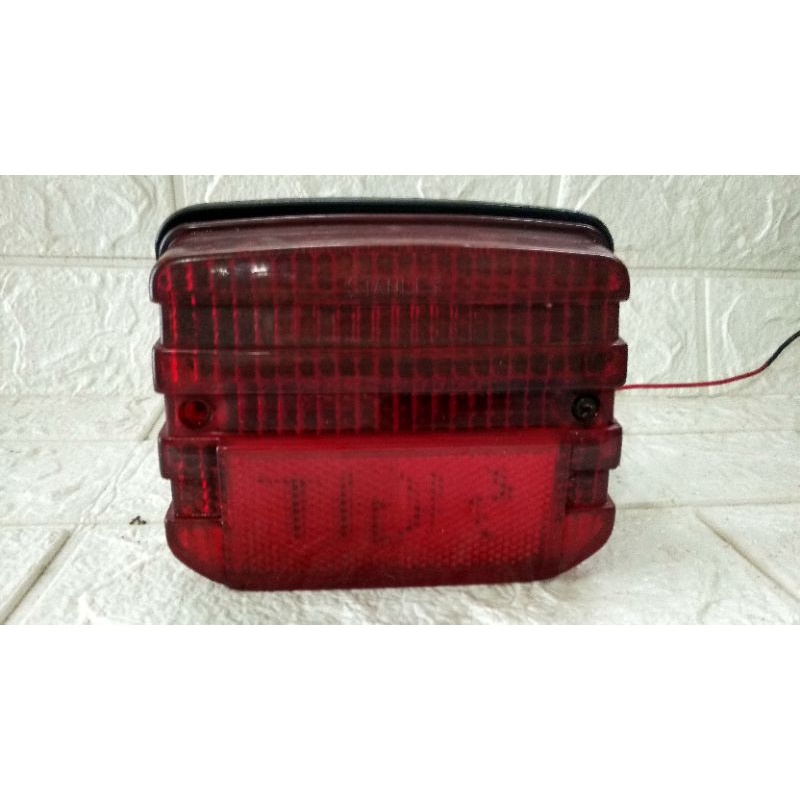 LAMPU BELAKANG GL 100/WIN ORIGINAL
