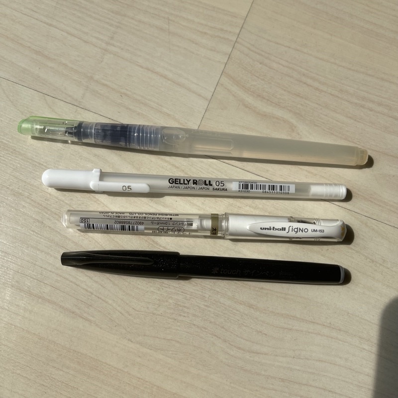 

pentel touch brush pen uniball signo white sakura gelly roll 05 brush pen