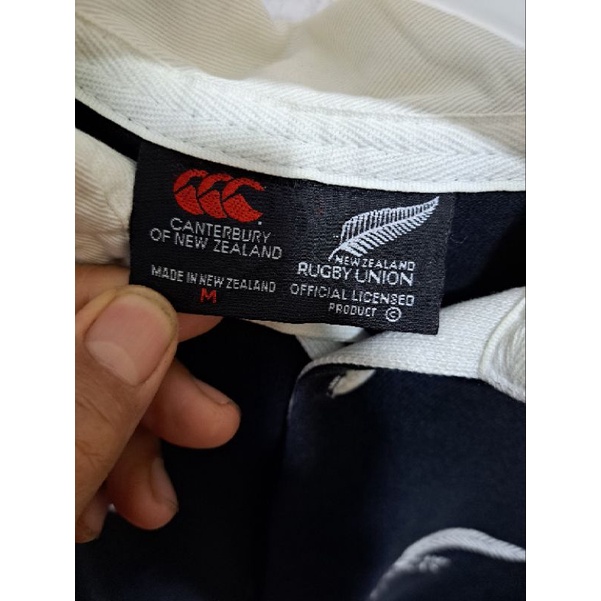 kaos kerah Canterbury