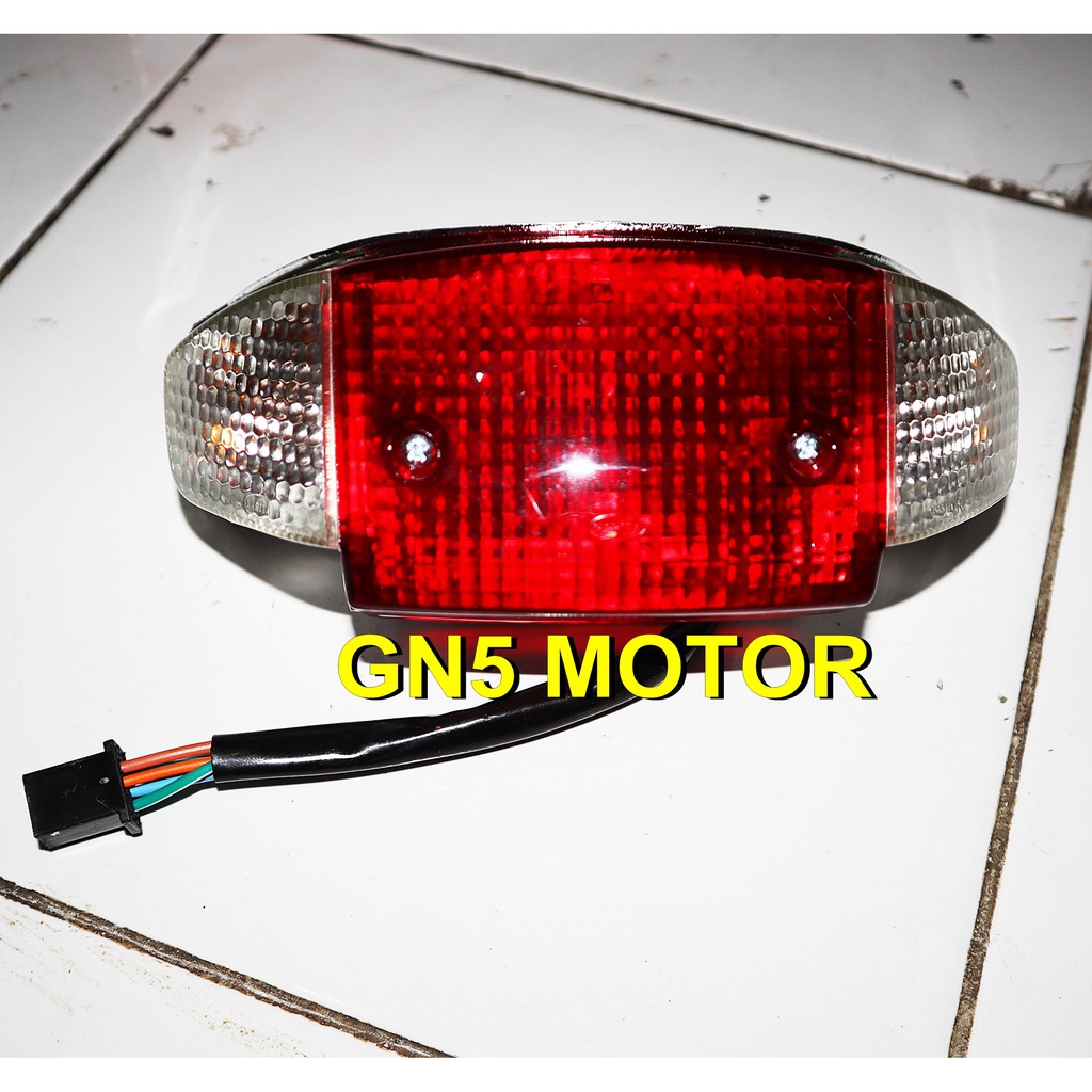 LAMPU BELAKANG / STOP LAMP ASTREA LEGENDA 1 / GRAND (MIKA STOP MERAH, MIKA SEN PUTIH)
