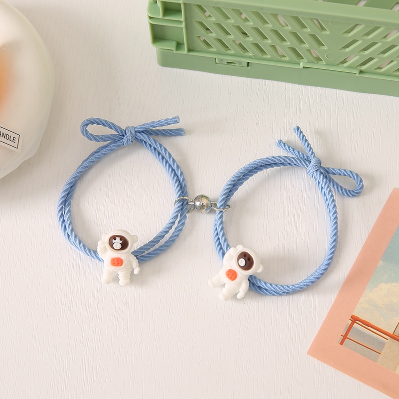 gelang magnet couple astronot