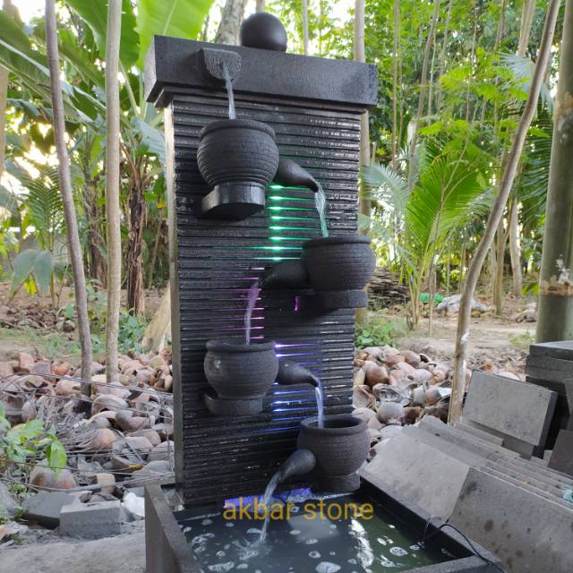 kolam air mancur batu