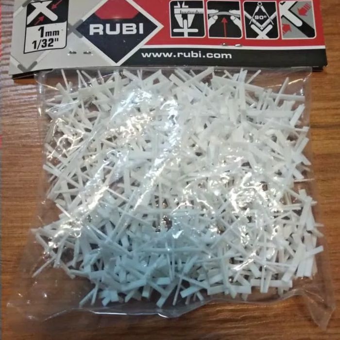 IOP |pembatas nat keramik Ruby tile spacer 1 mm untuk granit kramik