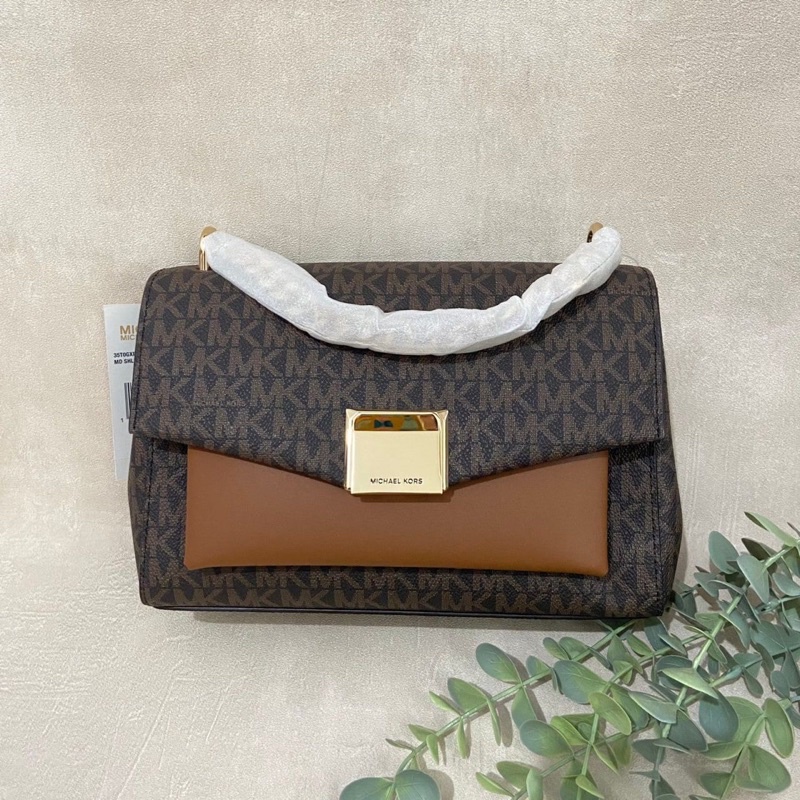 MK lita medium sign brown