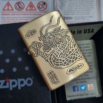 zippo naga dragon of japan golden gambar timbul dan pernamen