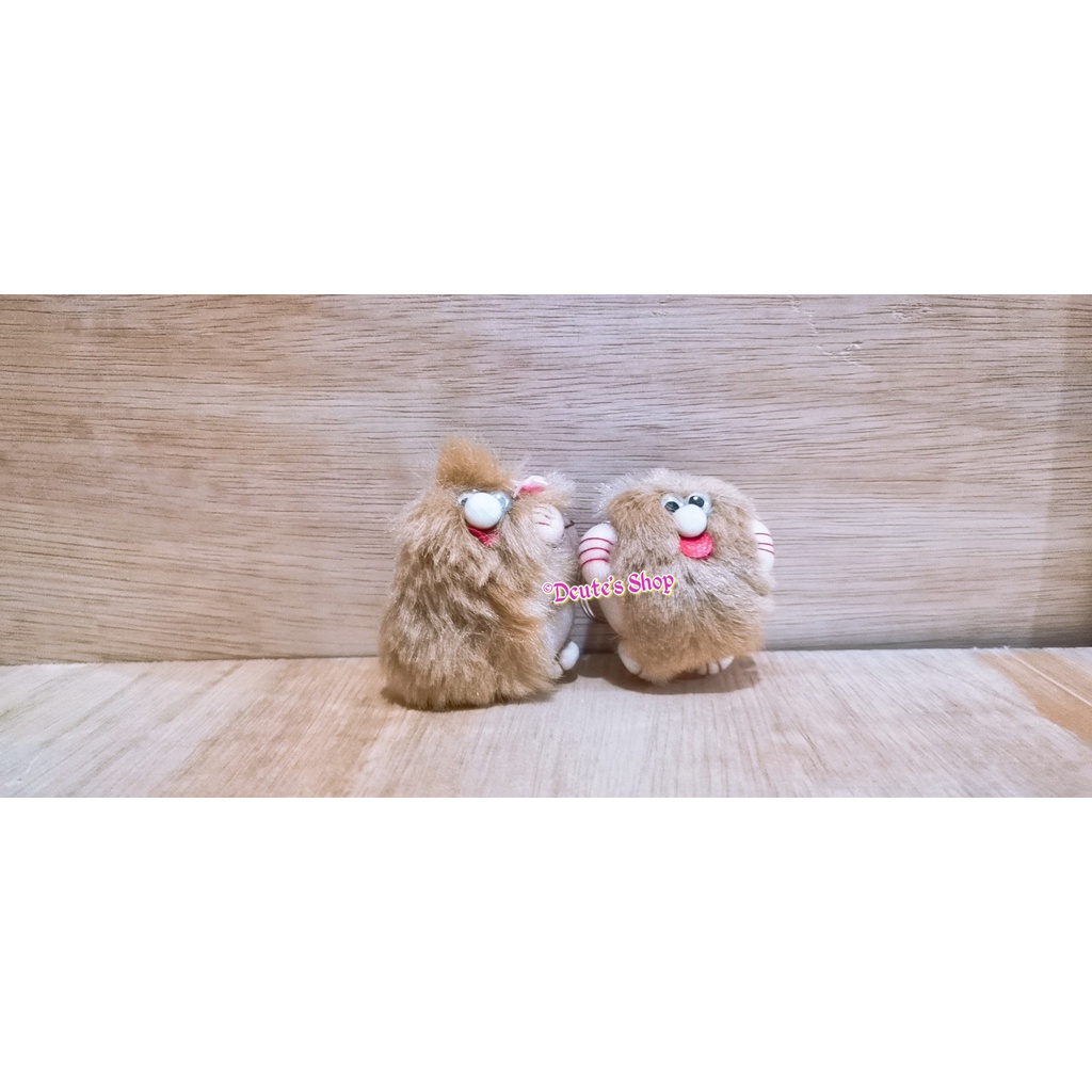 Boneka keychain couple manusia purba