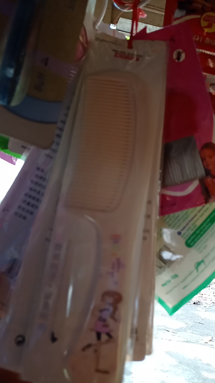 Naim_surya_asemka_sisir Gagang Kepala Motif Besar