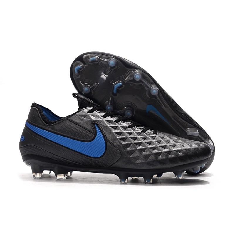 black and blue nike tiempo