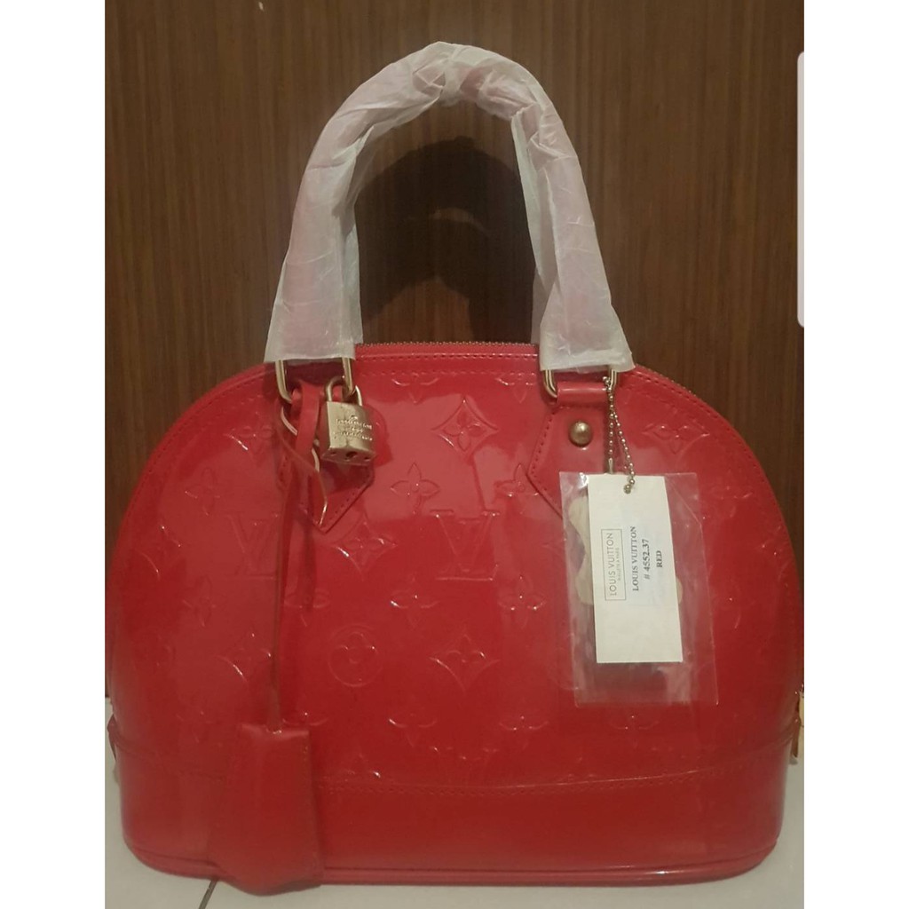 Tas LV merah