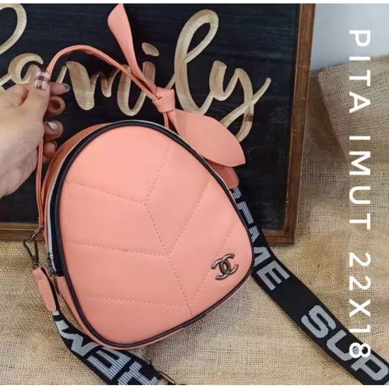 tas slempang cewek pita imut import / tas wanita import