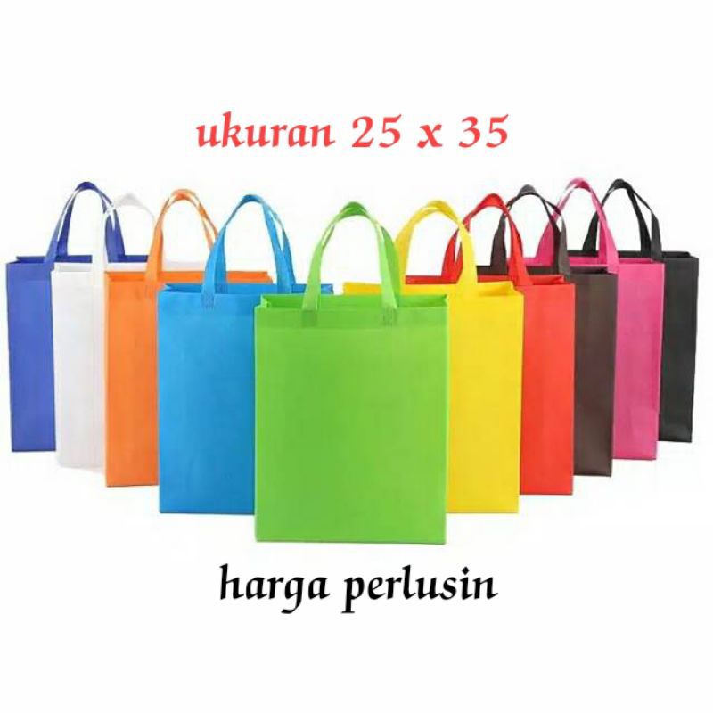 

Tas spunbond Satu pak isi 12 pcs uk 25x 35x 8 cm