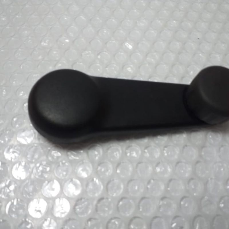 putaran kaca mobil manual
