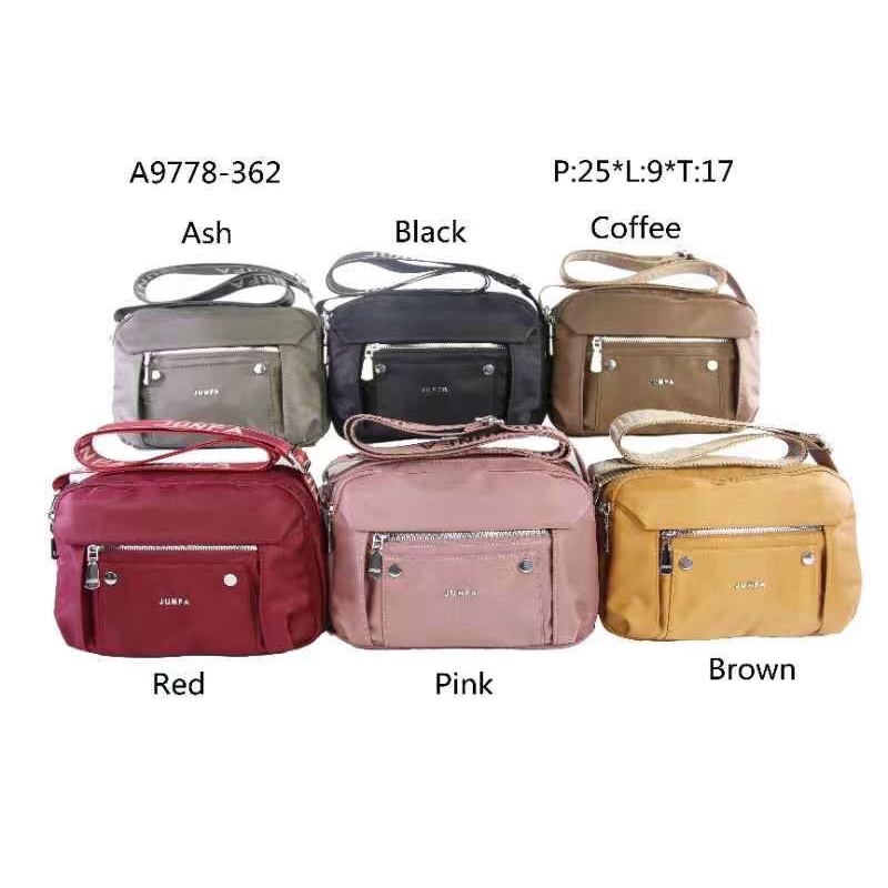 Tas selempang Junfa Bahan Parasut Terbaru. Size 27x12x15 cm. Tas Wanita Tas Selempang wanita Import Tas Junfa Import BEST SELLER TERBARU BISA BAYAR DITEMPAT.!!!!