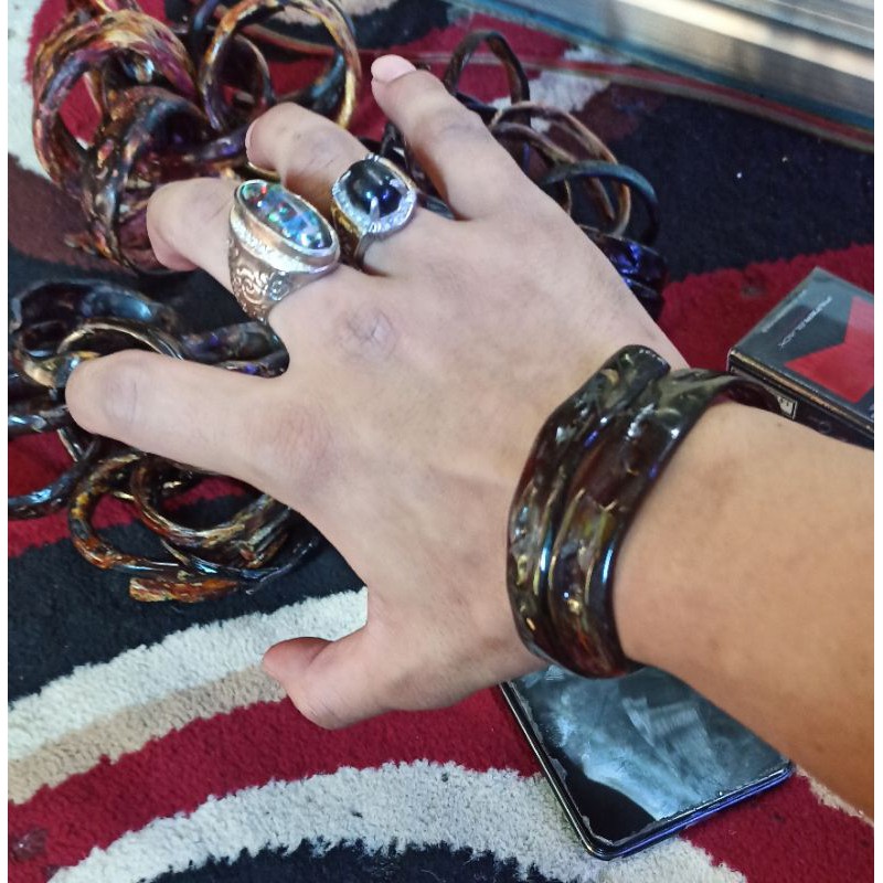 GELANG AKAR BAHAR MERAH BODY HITAM TEMBUS CAHAYA MURAH