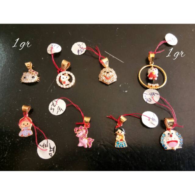 Liontin anak anak emas asli kadar 700/16k