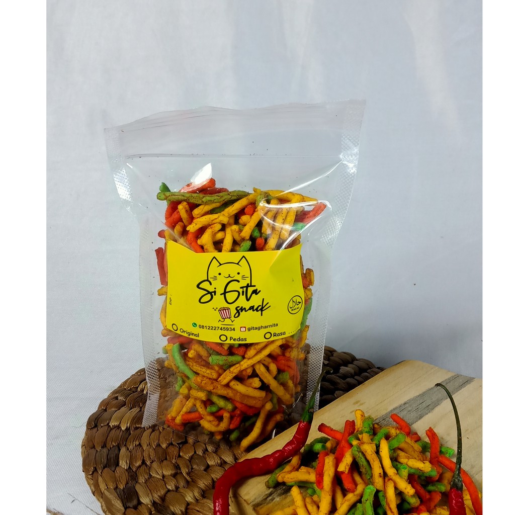 

CEMILAN PEDAS / KERUPUK PELANGI 100 GRAM