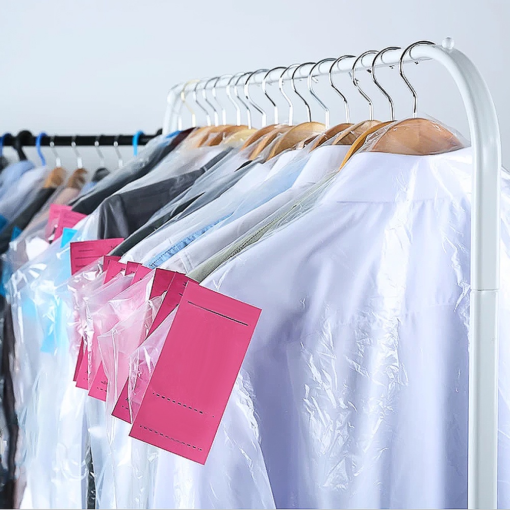 50pcs Plastik Film Transparan Anti Air / Debu Sekali Pakai Cover Pakaian / Jas Gantung