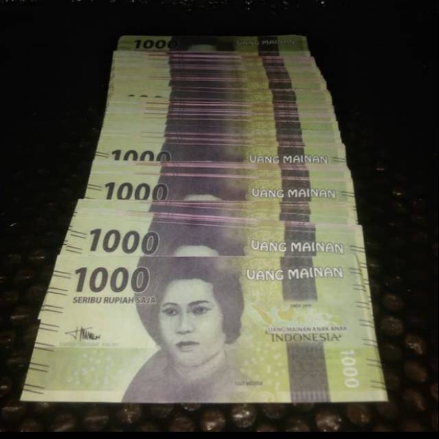 Uang kertas mainan pecahan 1.000 rupiah