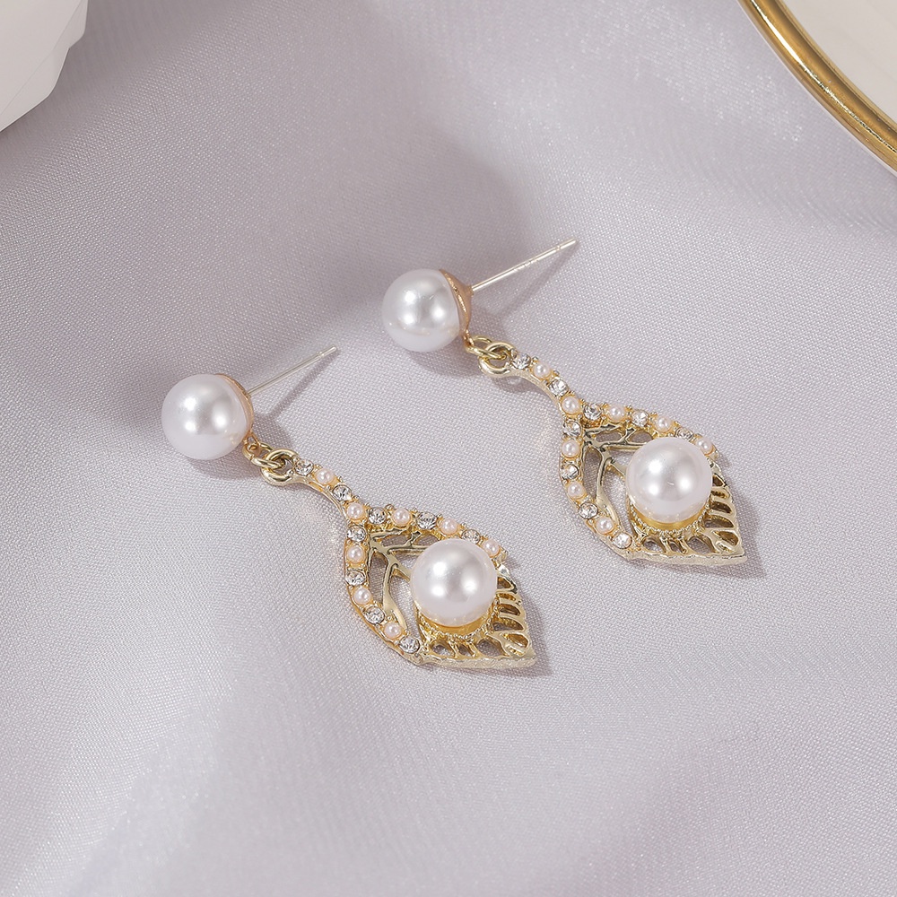 Silver Needle Japan and South Korea Simple Temperament Pearl Leaf Hollow Earrings Fashion Niche Design Personality Wild Earrings