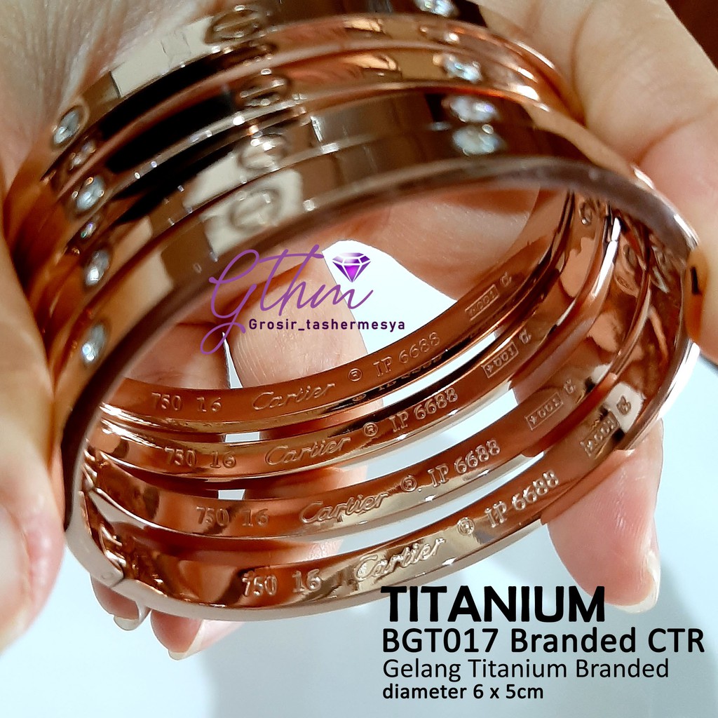 Gelang titanium cap 750 permata bgt077