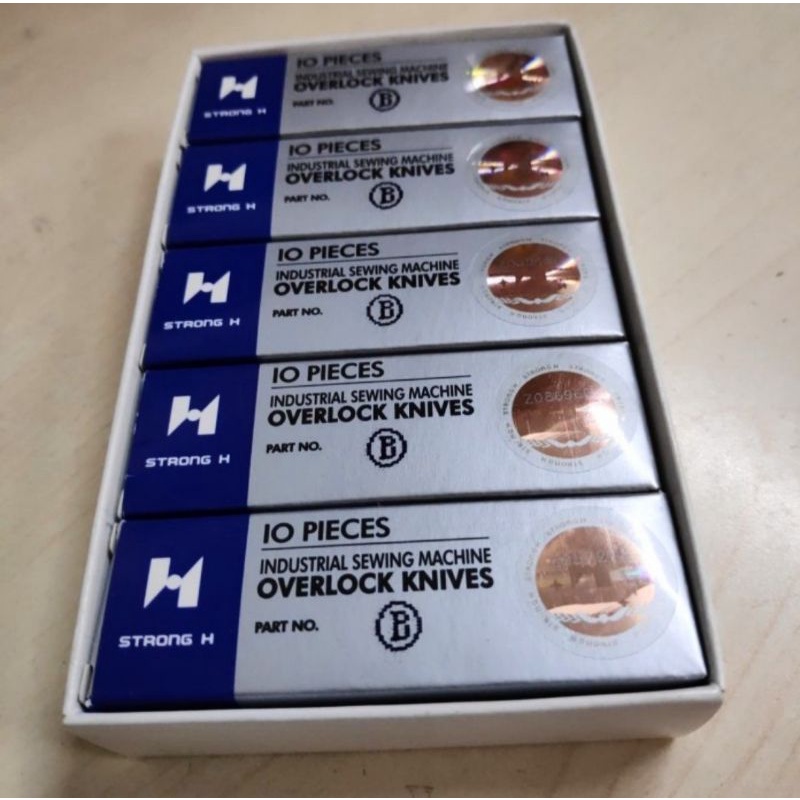 pisau bawah mesin obras  B