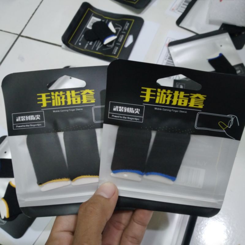 (grosir)sarung jempol jari finger gaming layar hp game isi 2 pic)grosir sarung jempol