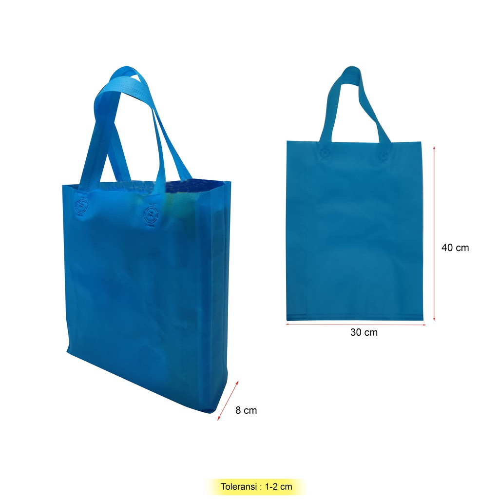 

Tas Spunbond 30x40+8 Goodie bag sponbon bahan kain furing non woven model handle pegangan tali