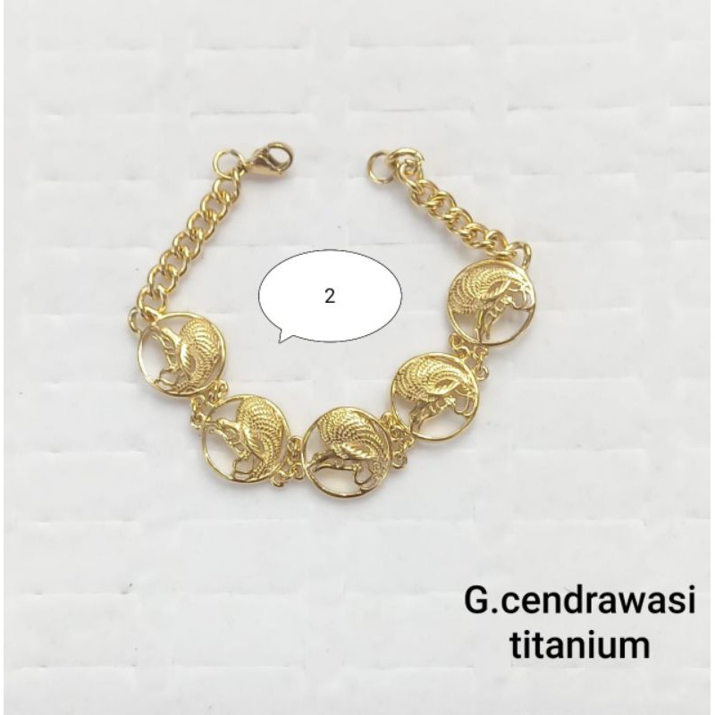 GELANG TANGAN TITANIUM MOTIF CENDRAWASIH WARNA EMAS