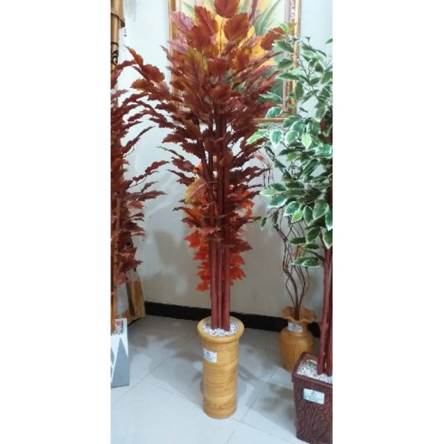 Daun alpukat warna cokelat articifial, batang kayu,  pot