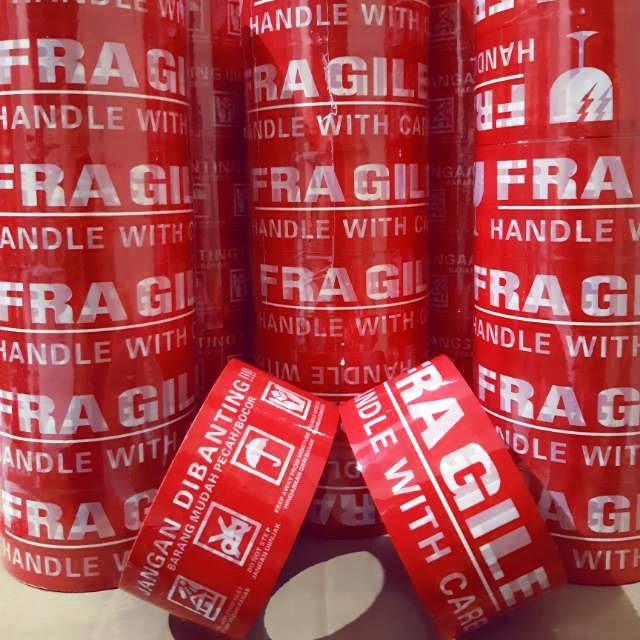 

LAKBAN FRAGILE MERAH 2"(48MM × 60 YARD FULL) SUPER MURAH HARGA PABRIK PROMO!!!