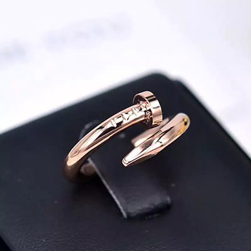 cincin titanium model paku emas harga satuan