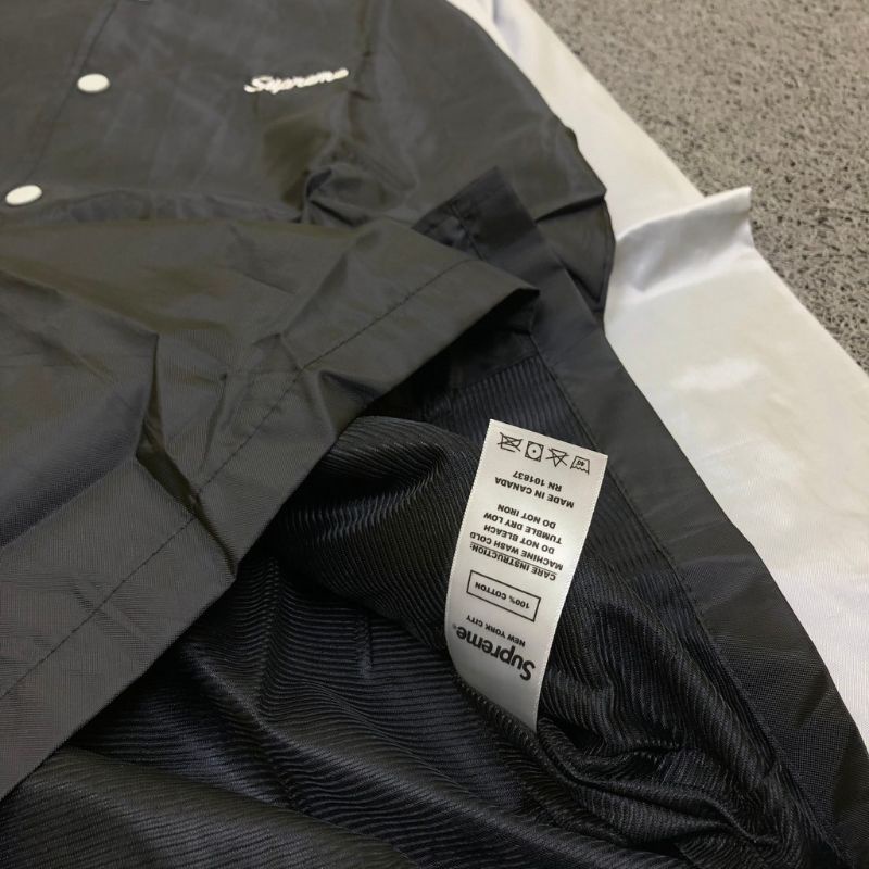 JAKET WINDBREAKER VARSITY SUPREME X CHAMPION HITAM PREMIUM AUTHENTIC TERLARIS