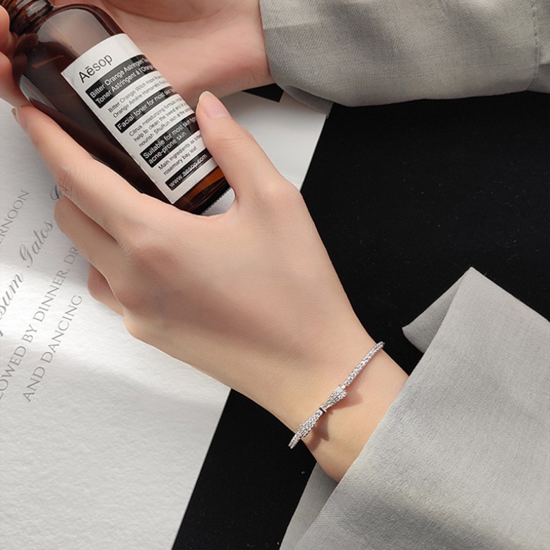 Gelang Zircon Bentuk Pita Warna Silver Untuk Wanita