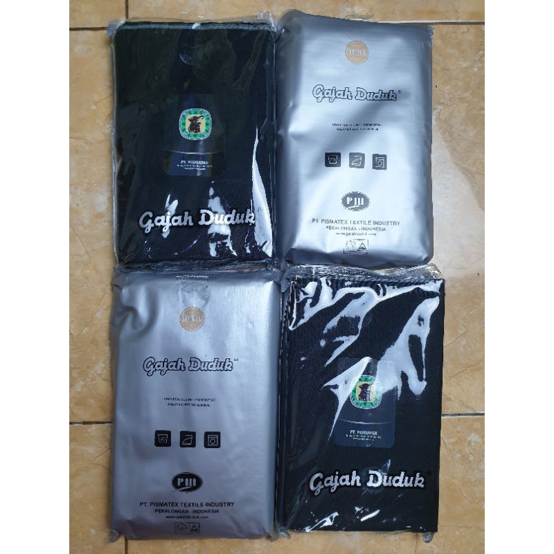 SARUNG POLOS HITAM GAJAH DUDUK