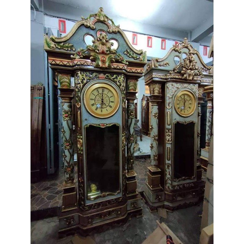 lemari jam hias bagong kayu jati