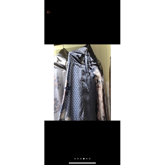 mukena wearing klamby