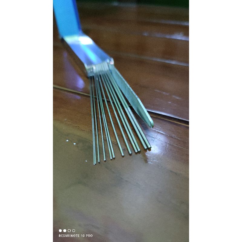 pembersih/ alat rojok manual