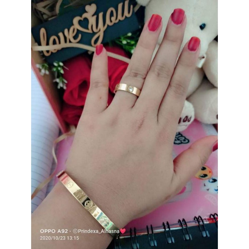 Set gelang cincin titanium.