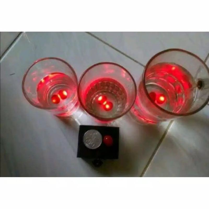 Batu Merah Delima ( Batu Menyala Dalam Air)