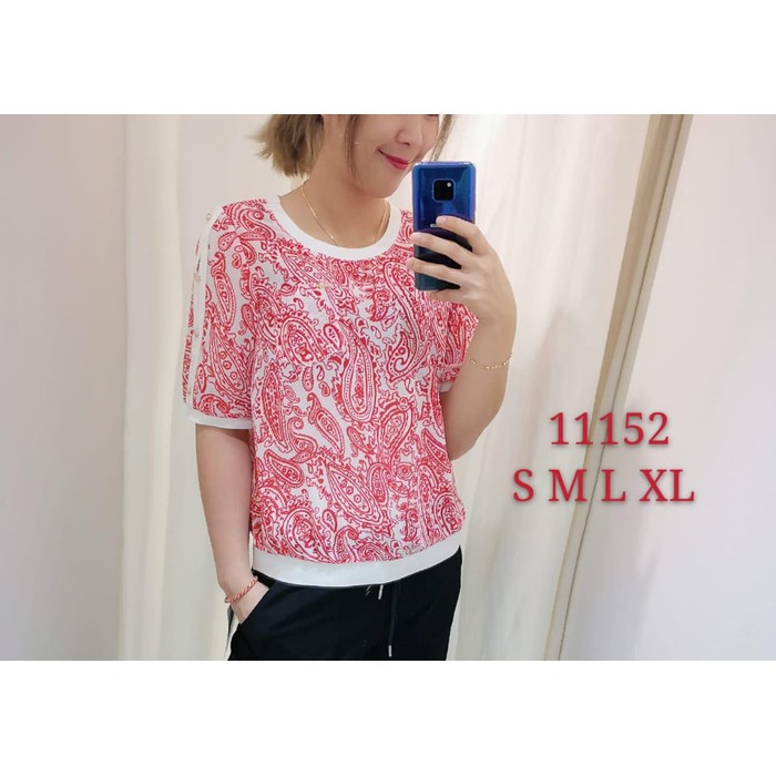 Kaos wanita singapore