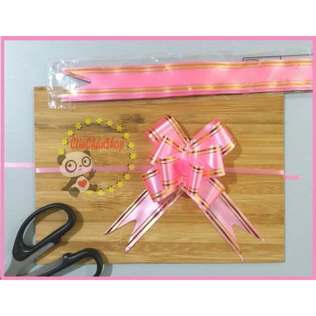 

pita souvenir pita kado tinggal tarik